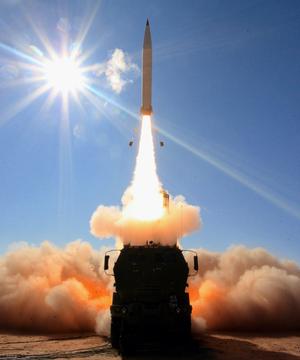An M142 High Mobility Artillery Rocket System (HIMARS) launches a PrSM with an extended range beyond 400 km at White Sands Missile Range, New Mexico. The Army is also collaborating with the Navy to develop a land-based Tomahawk and Standard Missile-6 (SM-6) capability to augment its long-range precision arsenal.