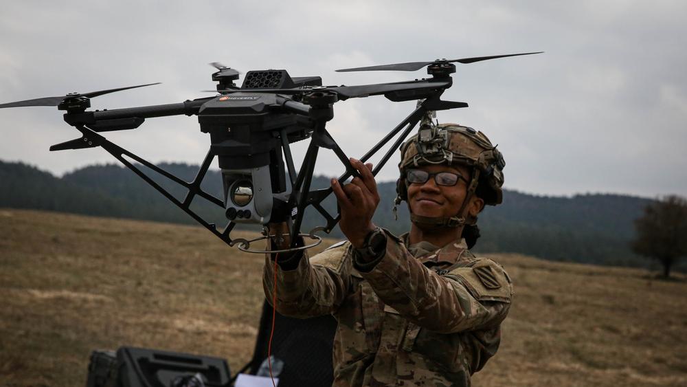 A soldier from the 8th Cavalry Regiment, retrieves a drone during the Allied Spirit 24 exercise in Germany, photo by Micah Wilson/U.S. Army