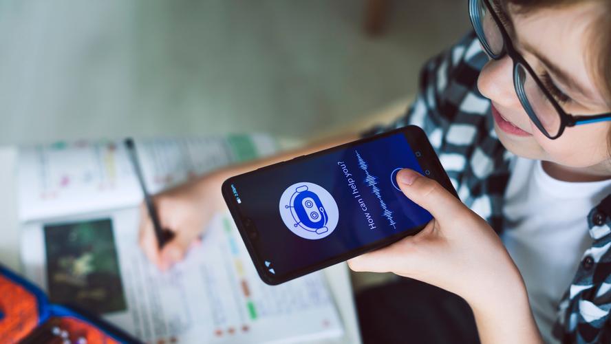 A boy using an AI chatbot on his phone to do his homework