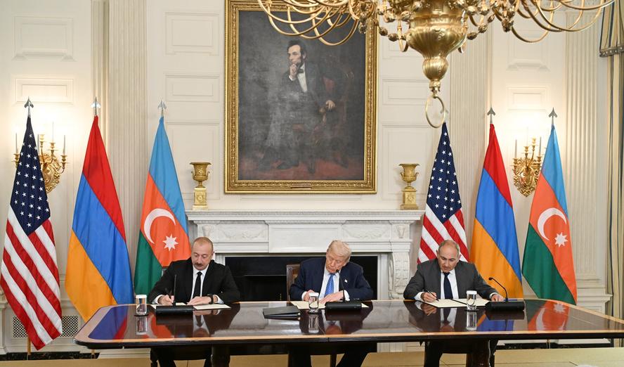Azerbaijani President Ilham Aliyev and Armenia's Nikol Pashinyan sign peace deal in front of U.S. President Donald Trump at the White House, August 8, 2025