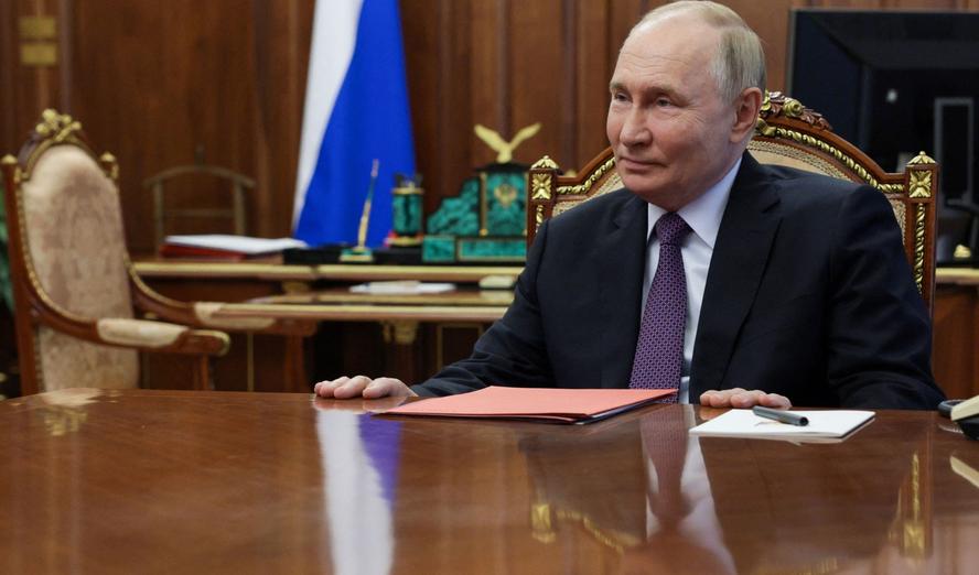 Photo by Sputnik/Alexander Kazakov/Pool via Reuters
