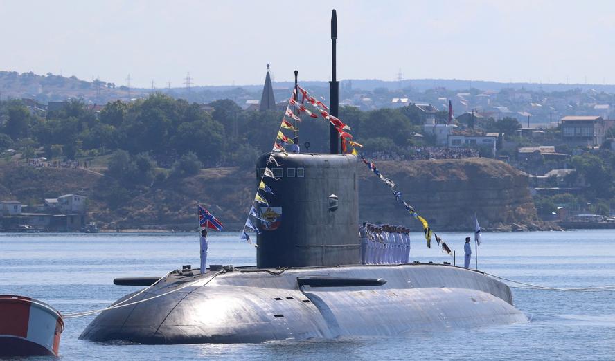 Russian sailors line up on board the diesel-electric submarine Novorossiysk during a rehearsal for the Navy Day parade in the Black Sea port of Sevastopol, Crimea, July 26, 2019