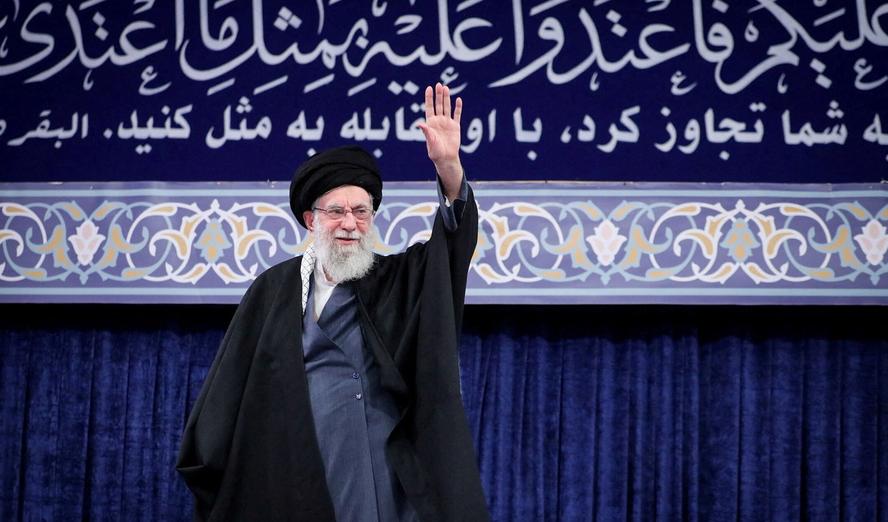 Iran's Supreme Leader Ayatollah Ali Khamenei waves during a meeting in Tehran, Iran, February 17, 2026