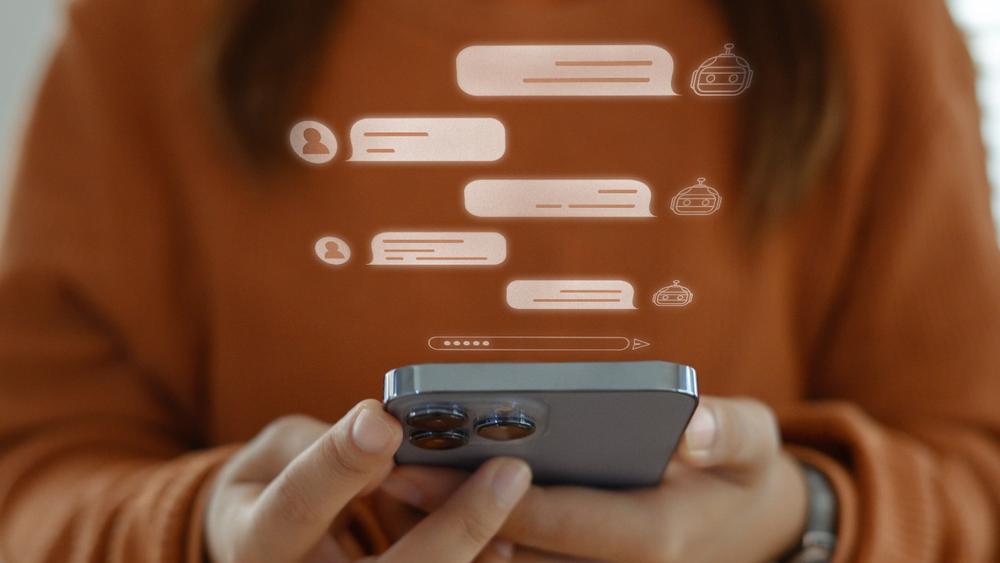 A young woman having a conversation with an AI chatbot