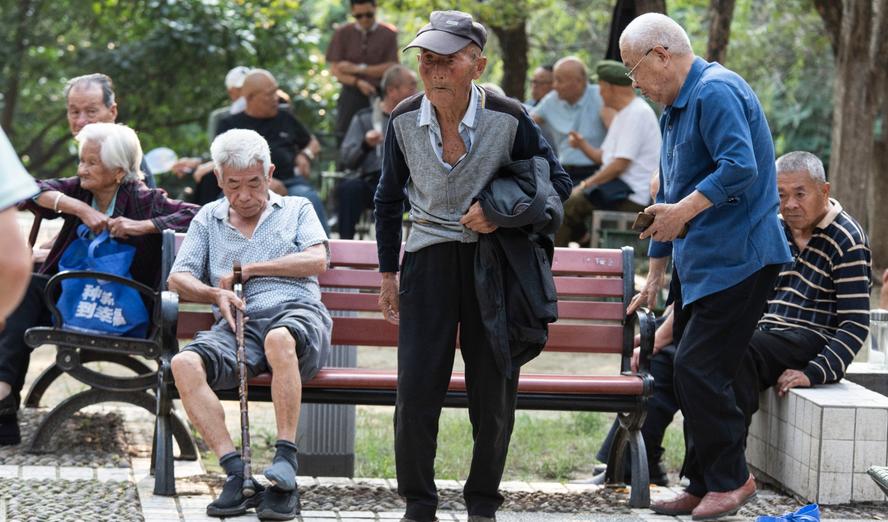 Older adults relax in Lindai Road Park in Fuyang City, Anhui Province, China, October 9, 2025